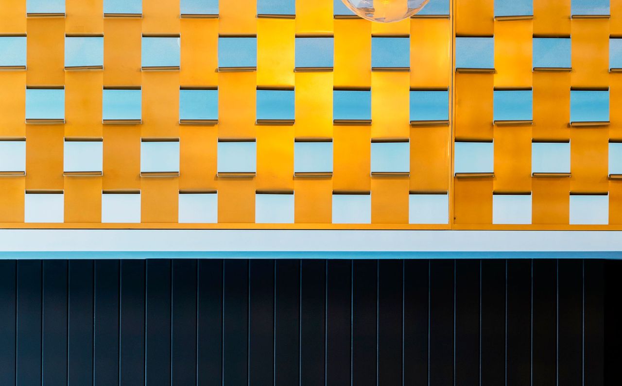 Metallic light structure conceptualised around the pages of the clubs historical documents