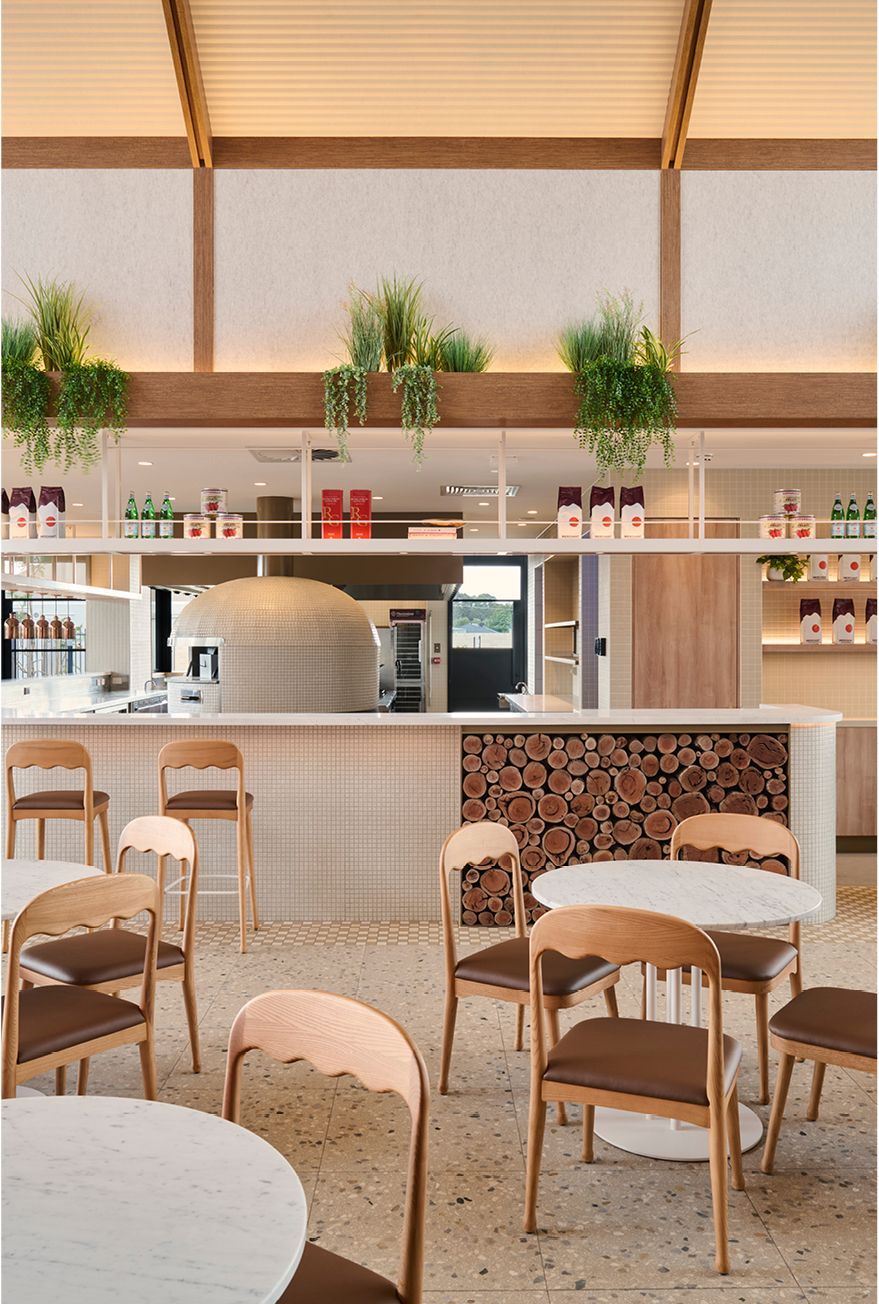 Light-filled dining completed with natural materials