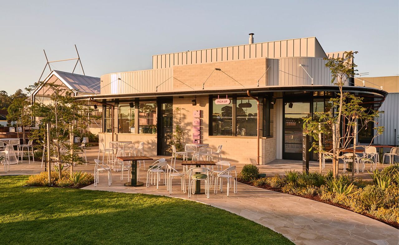 Alfresco dining among the landscaping outside Embr