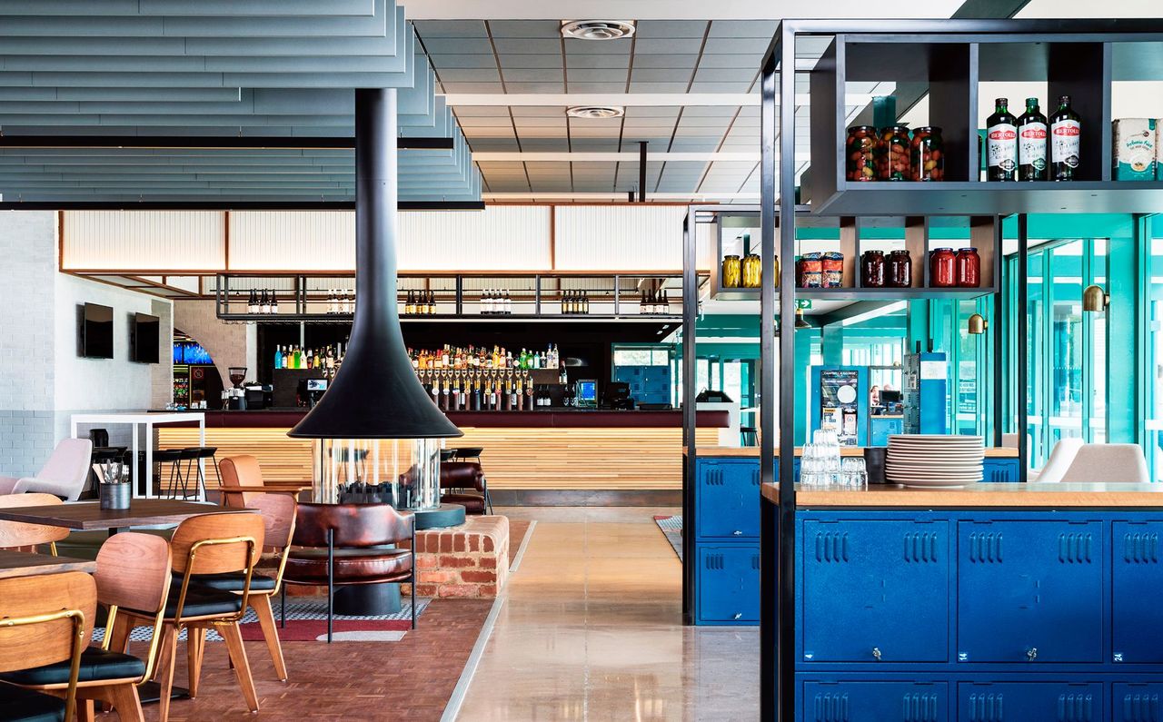 Completed bar & lounge with repurposed bowling lockers to divide up space