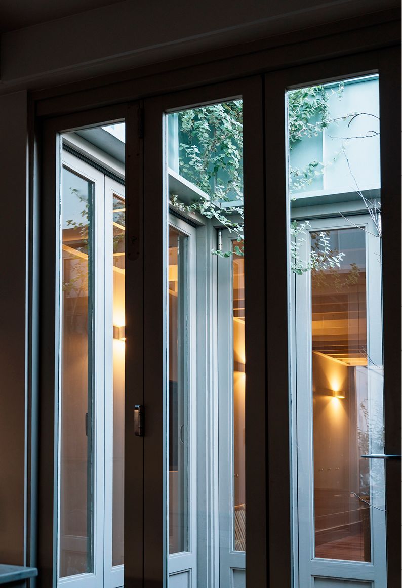 Small courtyard space between original cottage footprint and extension